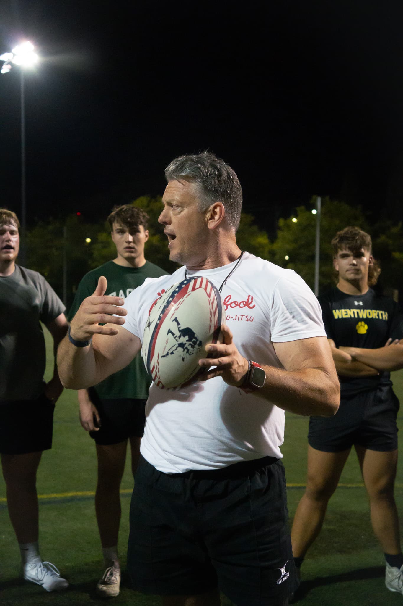 Ward Spangenberg coaching with rugby ball